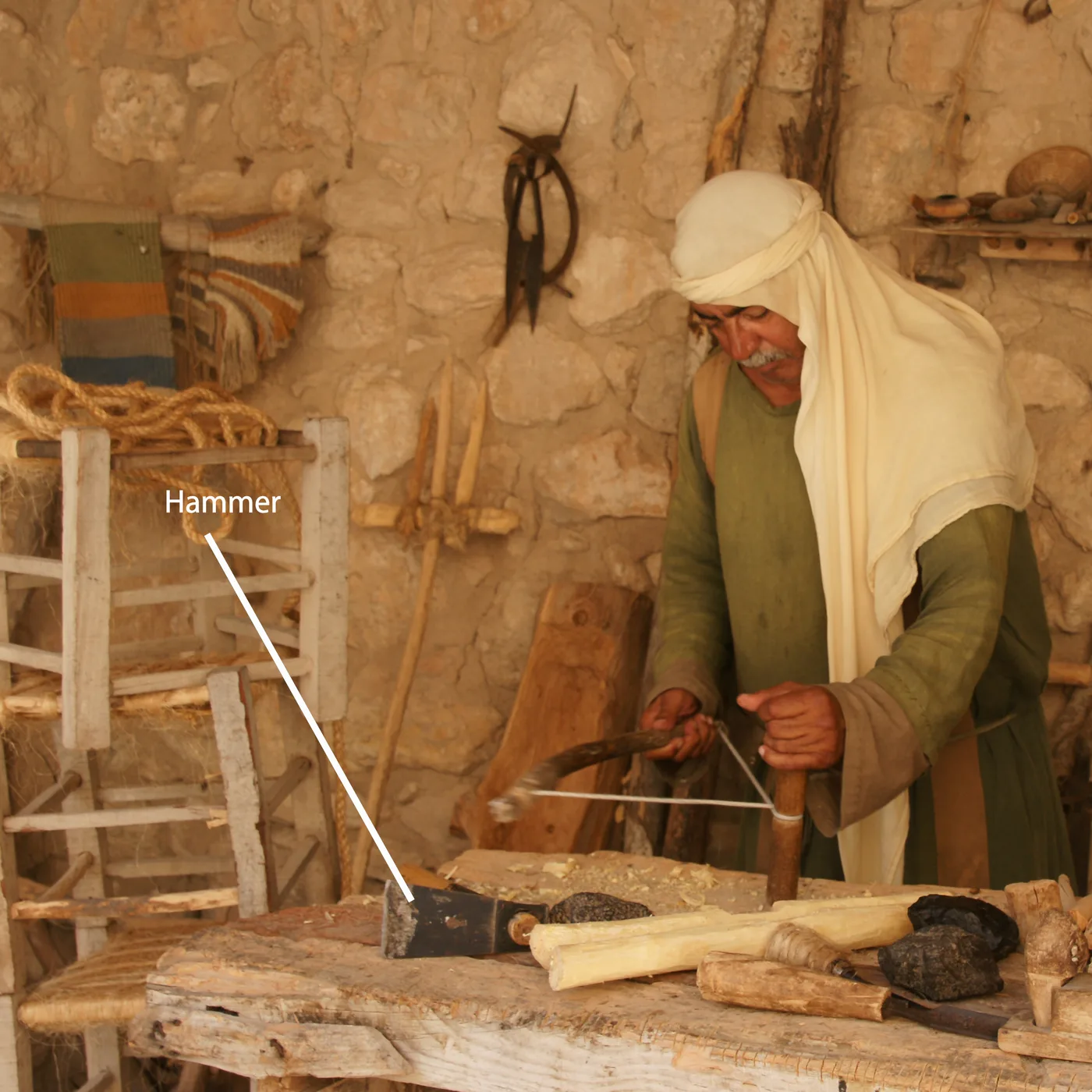 Drawing of a worker using a hammer