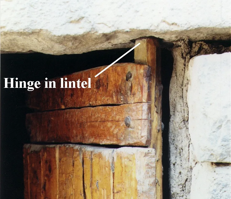 A wooden socket hinge on a door