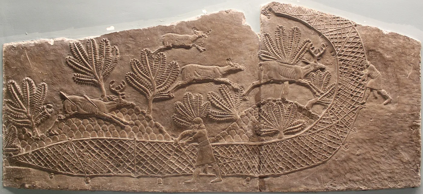 Men trapping deer in a net (Relief from the lion hunt of king Ashurbanipal, Northern Palace, Nineveh, Room S, panels 17-18, c. 645-635 BCE)