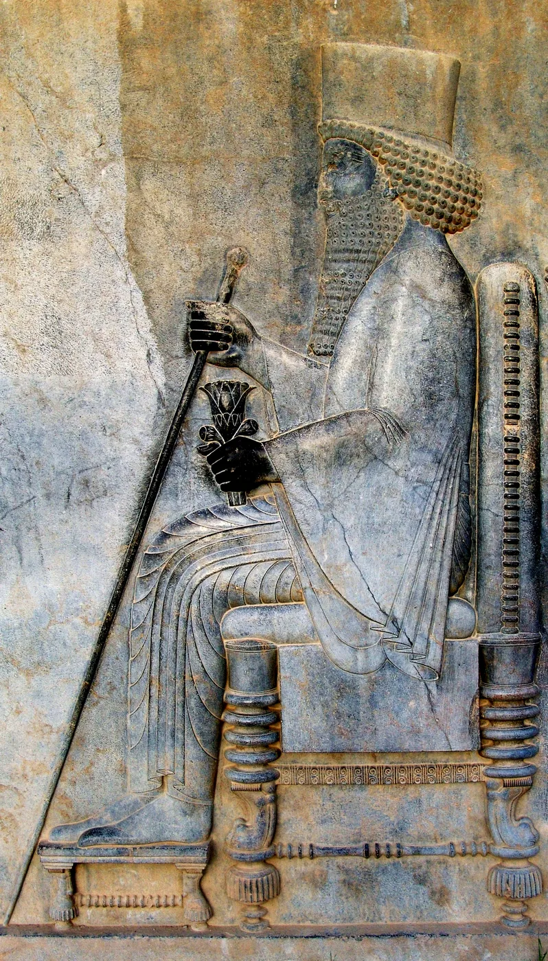 Relief of Darius sitting on his throne in Persepolis