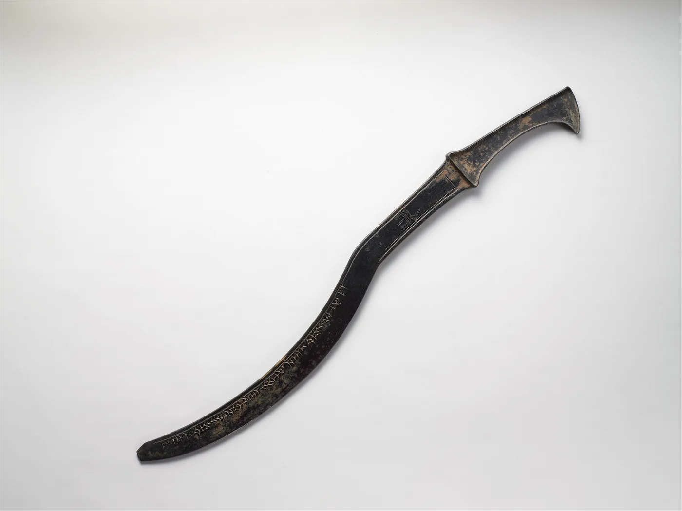 An Assyrian curved, or sickle, sword (ca. 1307–1275 BCE)