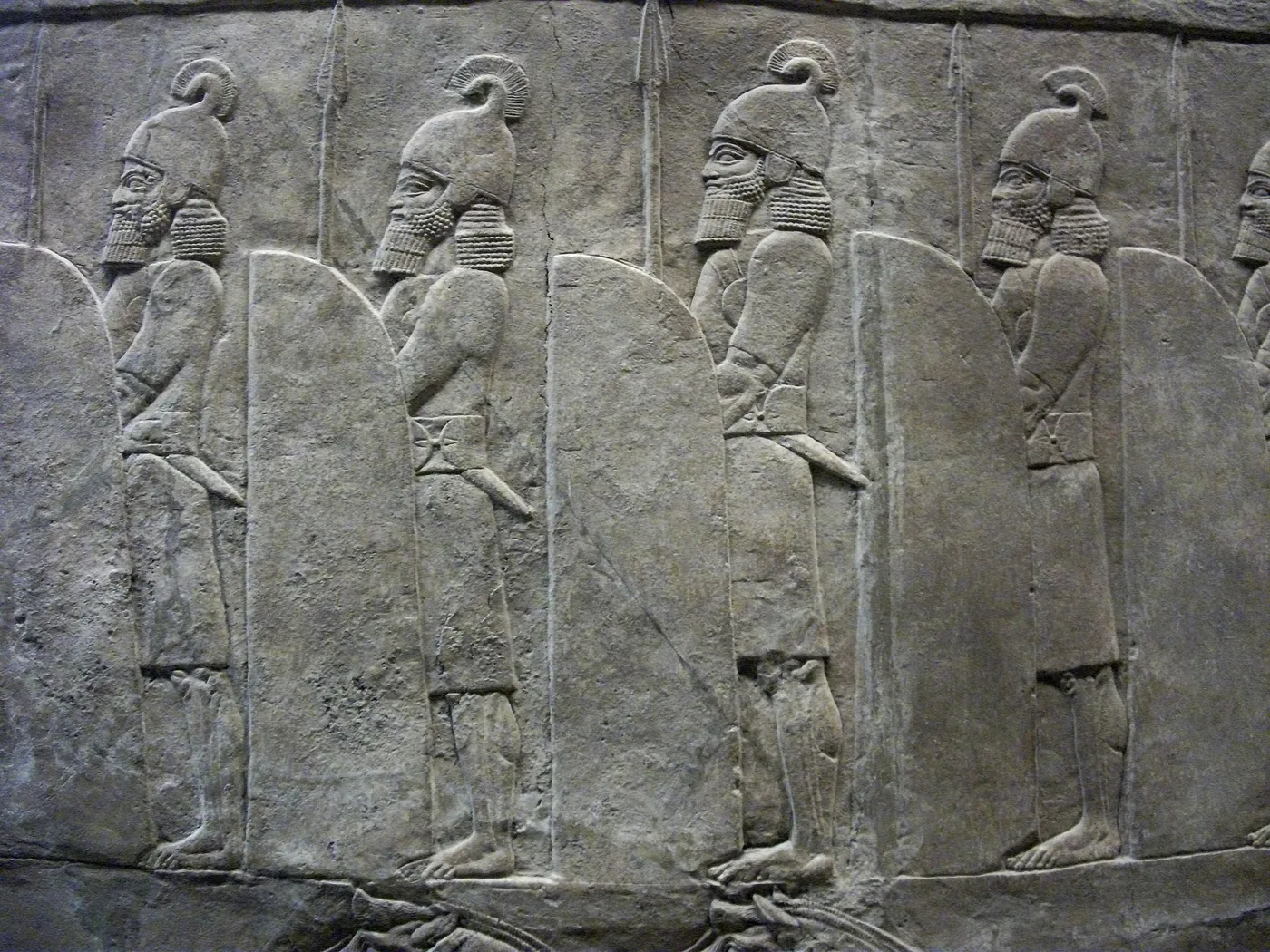Large shields held by soldiers at the lion hunt of Ashurbanipal (Room 10a, British Museum)