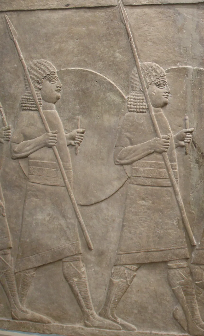 Soldiers with round shields (Neo-Assyrian Bas-Relief of Lion Hunt, Assyrian Gallery, British Museum)