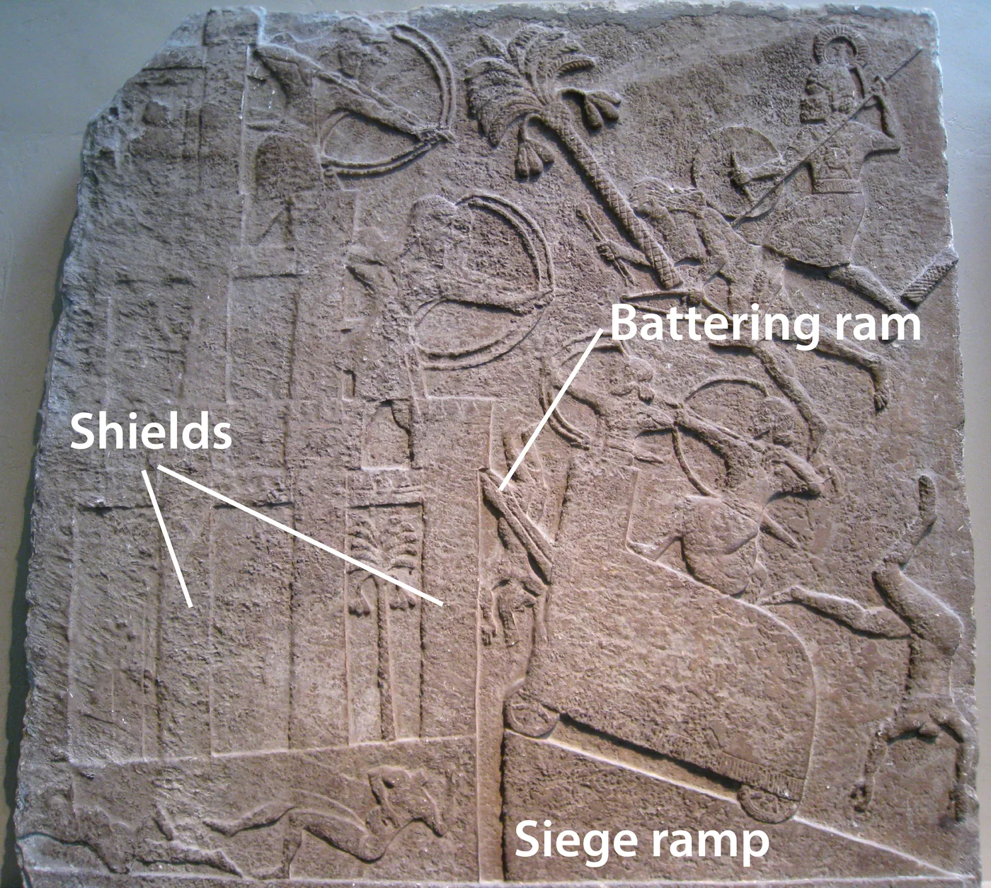 A relief showing the weapons used in attacking and defending a city