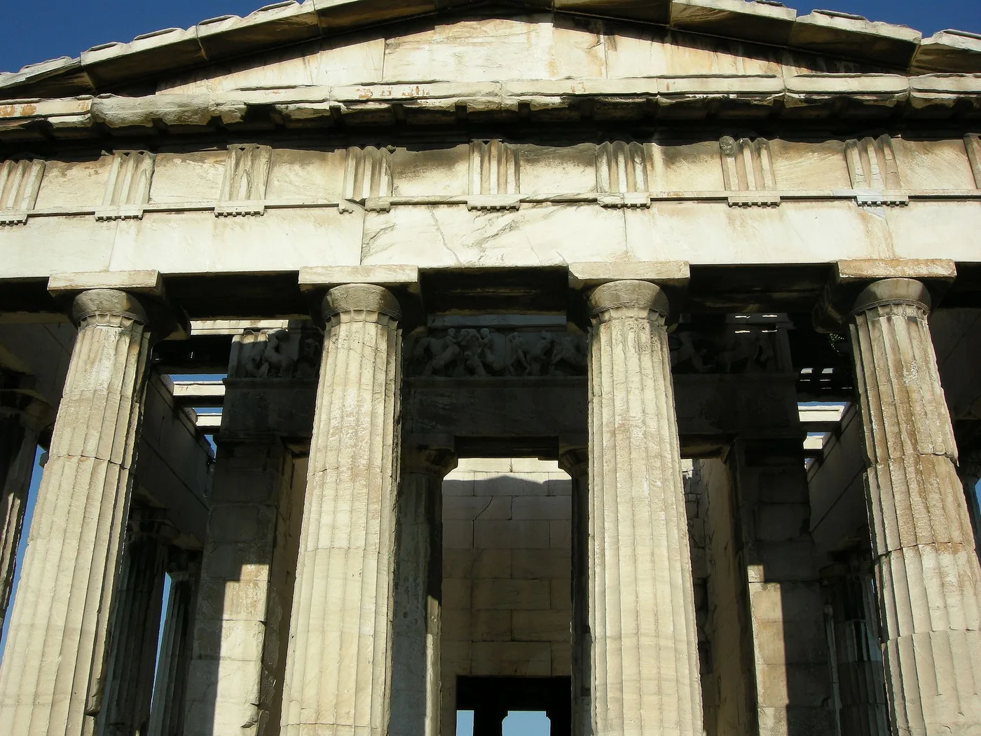 Front side of the temple of Hephaestus showing columns with capitals supporting the roof