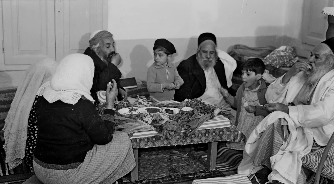 Family eating at a low table
