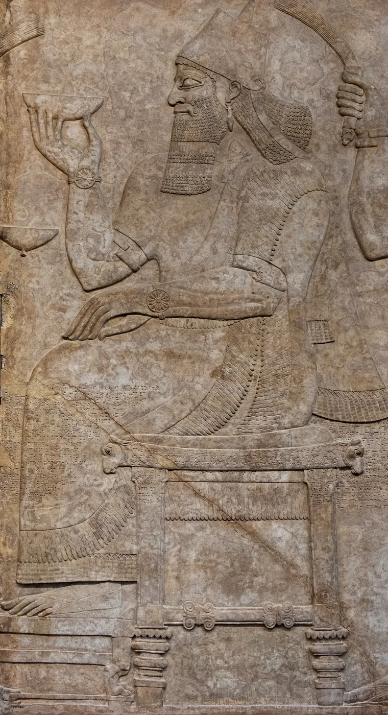 Chair without a back (Ashurnasirpal II, wall relief from Nimrud, Iraq, 9th c. BCE, British Museum)