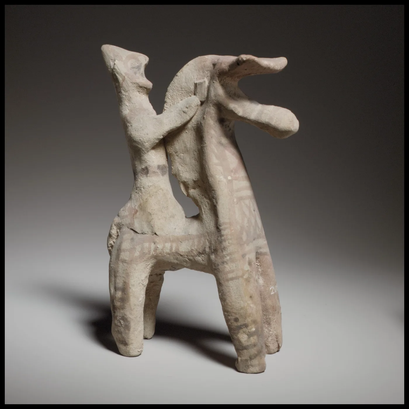 Horse and rider showing use of reins